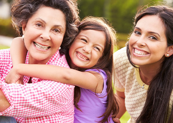 Hispanic grandmother, mother, and granddaughter