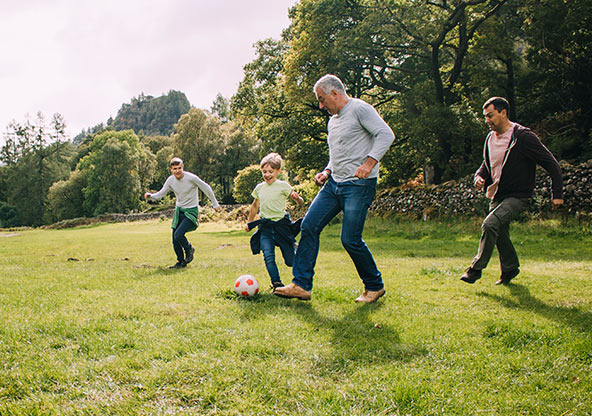 3 generations playing soccer together